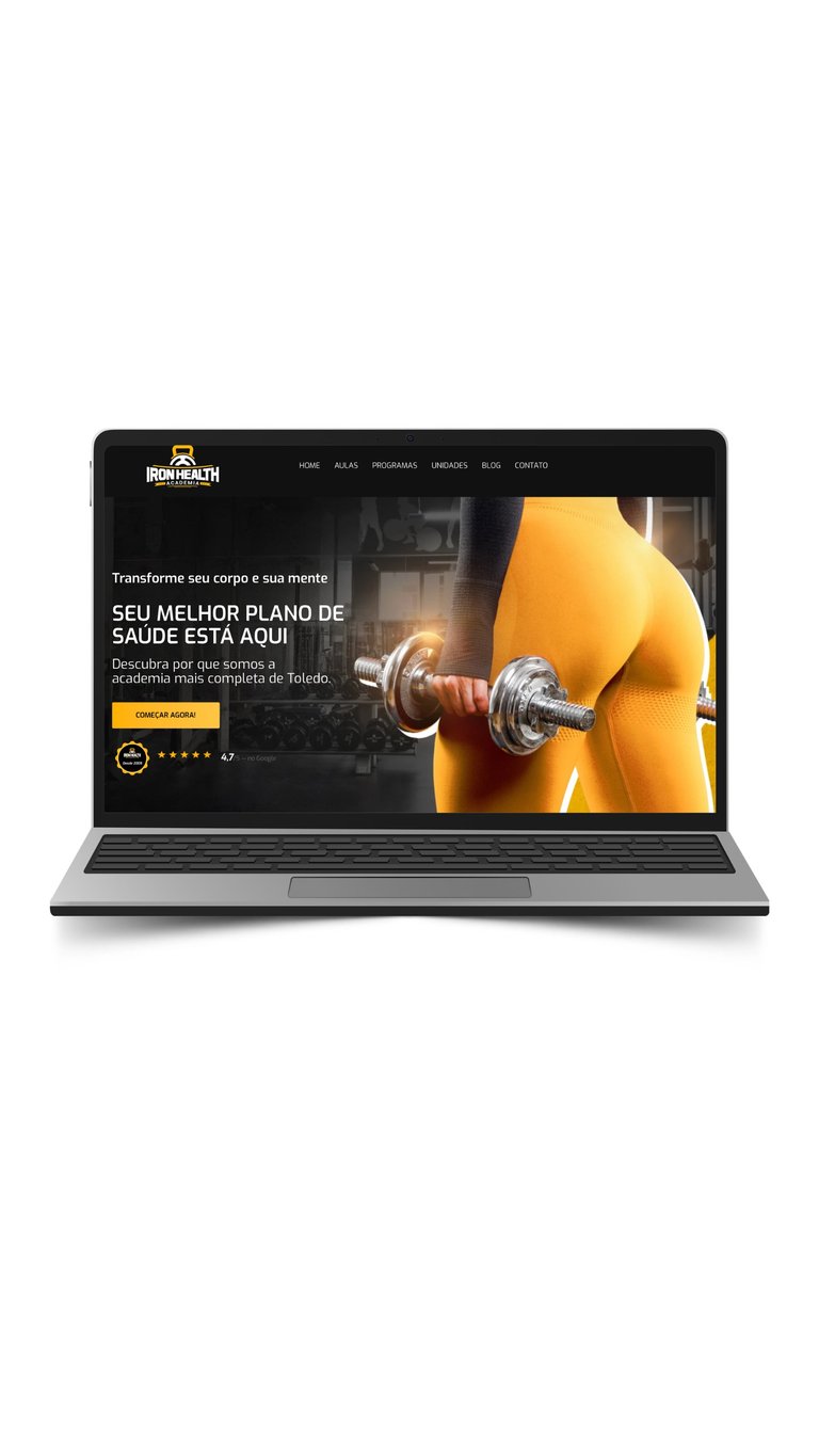 Laptop displaying a fitness website with a woman in yellow athletic wear holding a dumbbell and Portuguese health coaching navigation menu